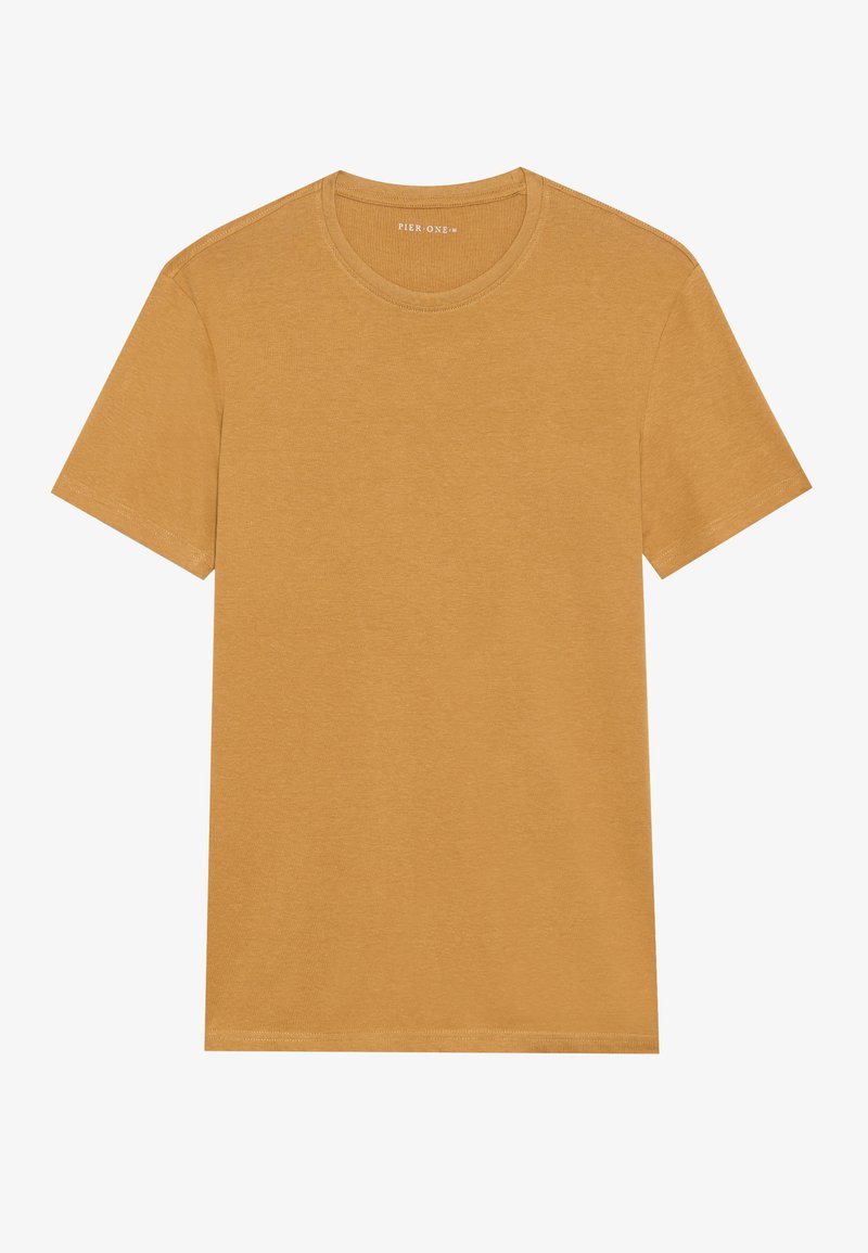 T-shirt à manches courtes et col rond de couleur jaune moutarde. Fabriqué en tissu doux avec une texture lisse, présentant des coutures propres et sans embellissements.
