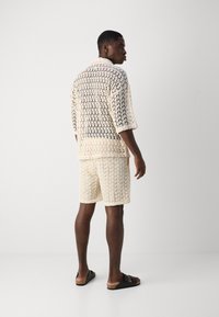 Heathe OLUROMBI SHORT SET - Poloshirts - cream