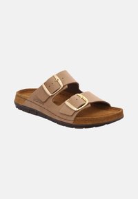 Bruna lädersandaler med två justerbara remmar, guldbuckles och en anatomiskt utformad fotbädd. Texturerad sula för grepp och stöd.