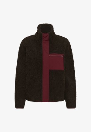 Tumedast pruunist fleece-jakist koos marooni vertikaalse paneeli ja lukuga rinna taskuga. Kõrge krae, tekstuuriga kangas ja pikad varrukad.