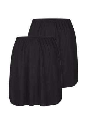 Zwei schwarze elastische Unterröcke mit gerafften Taillenbändern, vor weißem Hintergrund gezeigt.