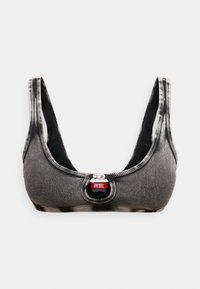 Μαύρο και άσπρο ριγέ μπικίνι τοπ με φαρδιές τιράντες, στρογγυλή θηλιά στο κέντρο και μικρή κόκκινη ετικέτα με το λογότυπο της Diesel. Υφή υφάσματος.