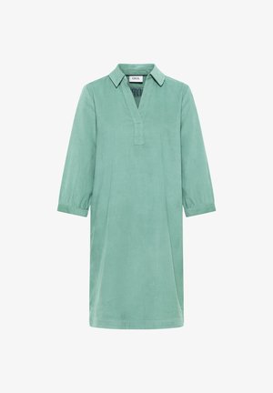 Mintgroene ribfluwelen jurk met driekwart mouwen, kraag en V-hals, knielang en losse pasvorm.