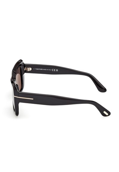 Svarta plastsolglasögon med en tjock båge, brunt tonade linser och guldaccent vid skalmen, med en rektangulär form och slät yta.