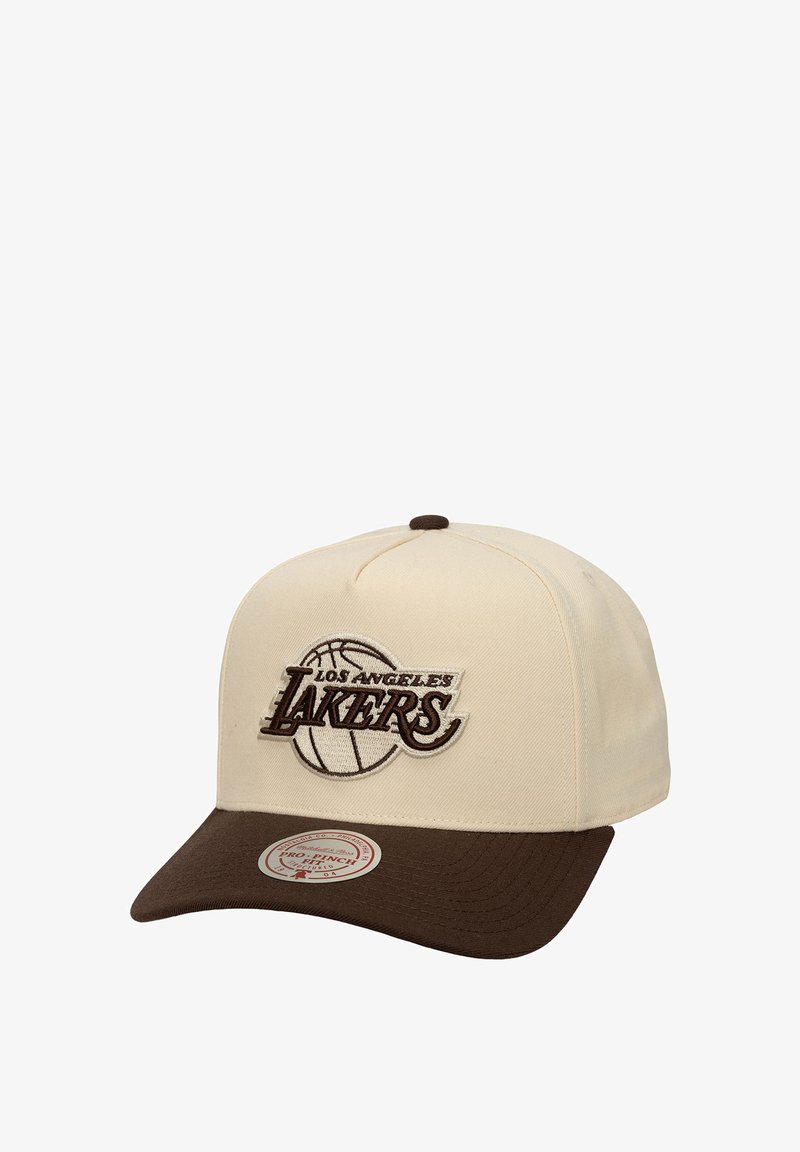 Cream baseball cap with a brown visor, featuring an embroidered "Los Angeles Lakers" logo and a basketball design on the front.