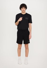 EA7 Emporio Armani - UNISEX - Basic T-shirt - black Thumbnail Image 1