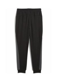 Zwarte sportbroek met een brede elastische tailleband, taps toelopende pijpen en contrasterende donkergrijze zijkanten. Gladde textuur overal.