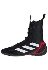 Black high-top basketball shoe with sleek textile upper, red accents, and three white stripes. Features a textured sole and robust lace-up design.