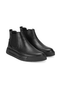 Bottines en cuir noir avec des inserts élastiques sur les côtés et une finition texturée, dotées d'une semelle en caoutchouc et d'un embout lisse.