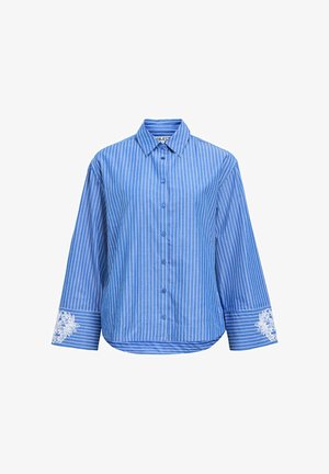 Camicia a maniche lunghe a righe blu e bianche con bottoni, con ricami floreali sui polsini e colletto a punta. Realizzata in tessuto leggero.