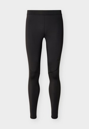 Zwarte nauwsluitende sportlegging met zichtbare naden en een gladde tailleband, frontaal weergegeven op een effen achtergrond.