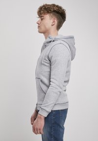 Urban Classics CONTRAST FLATLOCK STITCHED  - Cipzáras pulóver - grey/darkblue