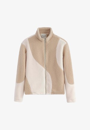 Veste en polaire avec fermeture éclair à l'avant, arborant un motif abstrait beige et crème, col montant et tissu texturé et doux.