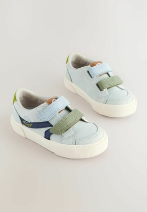 Light blue leather sneakers with green and navy accents. Features two Velcro straps, a textured white sole, and a cushioned interior.