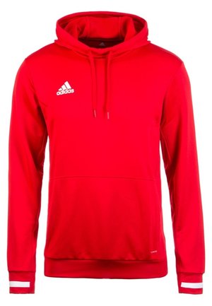 Czerwona bluza z kapturem Adidas z białym logo na piersi i białymi paskami na mankietach, z przednią kieszenią typu kangur i kapturem na sznurki.