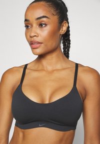 Nike Performance W NK ALATE MINIMALIST - Športová podprsenka s vysokou podporou - black/cool grey