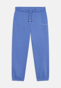 Blå bomullssweatpants med elastisk midje og snor. Har logodetaljering i hvitt på venstre lår og ribbede ankler.