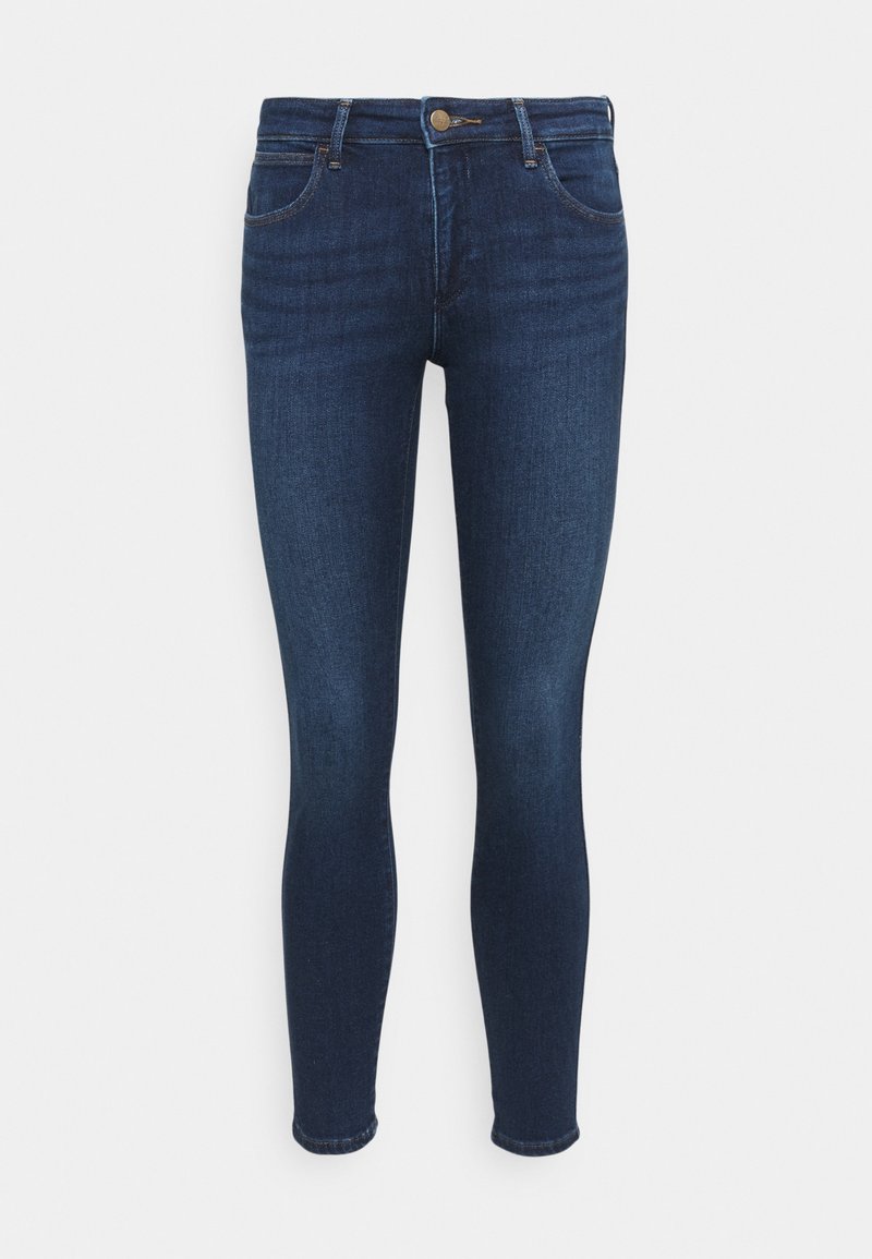 Smala jeans i mörkblå denim, med normal midja, fem fickor och diskreta sömnadsdetaljer vid sidsömmarna.