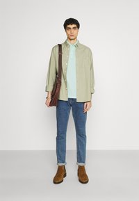 Tommy Hilfiger Polo - oxygen