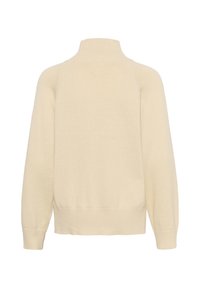 Pull en maille de couleur crème avec manches longues, poignets côtelés, ourlet côtelé et col roulé côtelé haut.