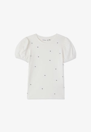 Top bianco a maniche corte con maniche a sbuffo, scollo rotondo e strass decorativi sparsi su tutto il tessuto. Morbido materiale di cotone.