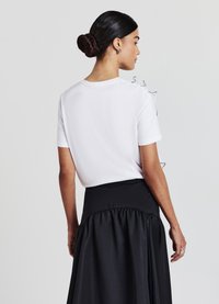 Calliope FRILL - T-shirt con stampa - bianco ottico