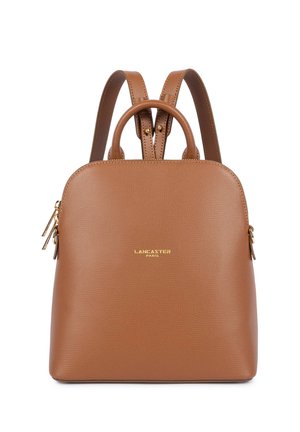 Brown leather backpack with two shoulder straps, a small handle, gold zippers and "Lancaster Paris" logo on front.