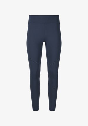 Marineblaue athletische Leggings in voller Länge mit hohem Bund und kleinen reflektierenden Punkten an Oberschenkeln sowie einem Logo am unteren Bein.