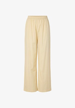 Pantalon ample beige clair avec fines rayures verticales et taille élastique, longueur totale avec jambes larges.