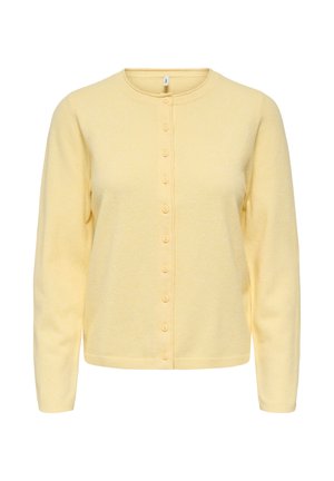 Cardigan giallo con bottoni realizzato in tessuto morbido e strutturato. Presenta una scollatura rotonda, maniche lunghe e una fila di bottoni abbinati.