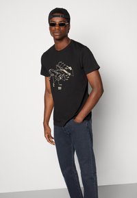 Levi's® Skateboarding SKATEBOARDING 501® - Sirgete säärtega teksad - blue