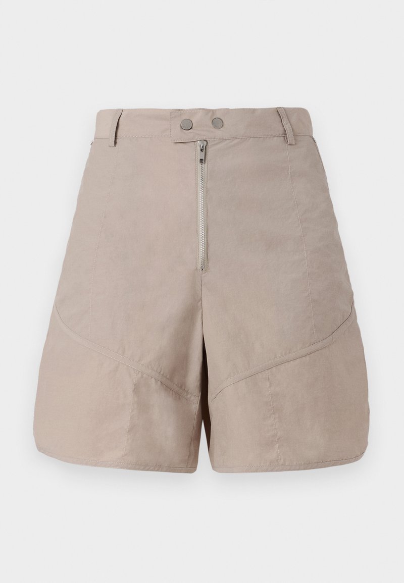 Beige shorts with a smooth, textured fabric. Features a front zip closure, two button fastenings, and diagonal seam detailing.