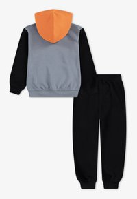 Jordan UNISEX - Tracksuit - black/starfish