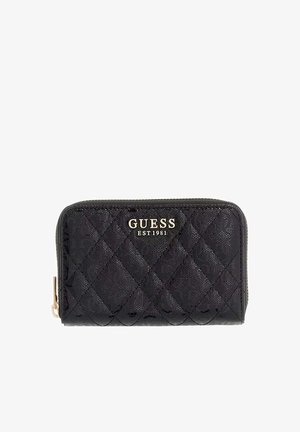 Portefeuille noir matelassé avec un logo doré "GUESS EST 1981" et une fermeture éclair sur le côté gauche.