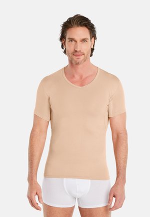 FINN Design ANTI SCHWEISS MIT ZUSÄTZLICHER EINLAGE AM RÜCKEN - Undershirt - nude
