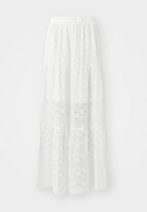 White tiered maxi skirt made of lace fabric, featuring a wavy pattern and an elastic waistband. Light and flowing design ideal for warm weather.