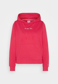 Felpa rosa con cappuccio, tasca frontale, cordini e logo "Tommy Jeans" ricamato sul petto e piccolo logo a bandiera sul polsino.