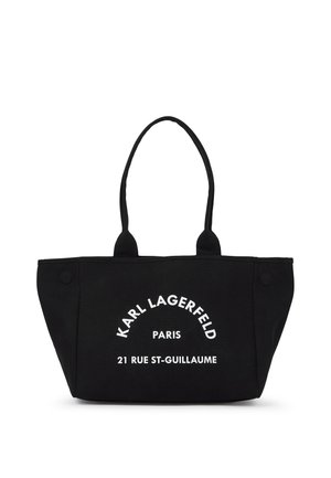 Black tote bag with two handles, made of canvas, featuring white text: "KARL LAGERFELD PARIS 21 RUE ST-GUILLAUME." Approximate rectangular shape.