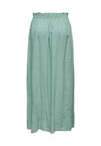 Lichtgroene wijde broek met bloemenpatroon, elastische tailleband en gestreepte rand. Zachte stof met een vloeiende uitstraling.