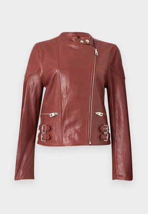 Chestnut brown leather jacket with asymmetrical zip closure, two zip pockets, buckle straps at waist, and a snap-button collar.