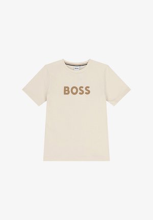 T-shirt beige a maniche corte con scollo rotondo, con la scritta "BOSS" in lettere marroni bold sul petto.