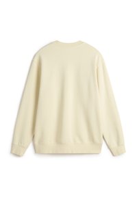 Sudadera de cuello redondo en suave tela amarilla clara. Mangas largas, puños y dobladillo acanalados, hombros sin costuras con textura suave. Sin gráficos.