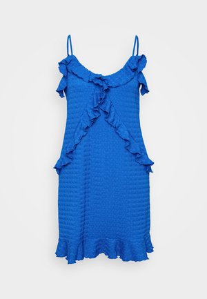 Sinine ilma varrukateta kleit, millel on tekstuuriga kangas, volangiga kaelus ja ääred ning laienev esitlus. Ükski lukustus ega mustrid ei ole nähtavad.