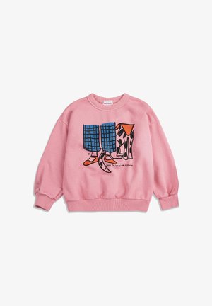 Pink sweatshirt with illustration of blue checkered pants, orange shoes, and a spotted dog standing side by side, text reads "Dog Friendship."