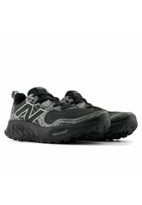 Scarpe da corsa nere con tomaia in mesh testurizzato, dettagli riflettenti e intersuola nera imbottita con battistrada a motivo.