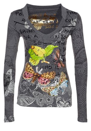 Gray long-sleeve shirt featuring butterfly graphics and text elements. V-neck design with varied textures and patterns on fabric.