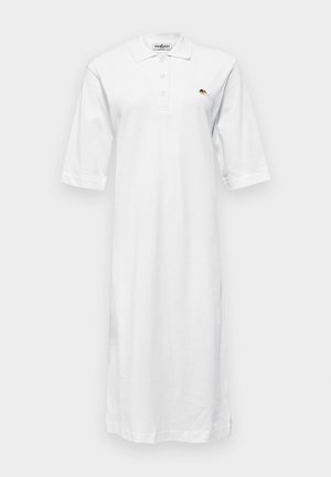 White, knee-length polo dress made of cotton with a collar, short sleeves, and a small embroidered design on the left chest.