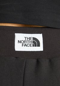The North Face WIDE LEG JOGGER - Treniņtērpa apakšdaļas - black