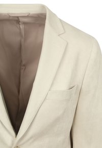 Lichtbeige blazer met een gladde textuur, aangeknipte revers, enkele borstzak en een zachte binnenvoering. Minimalistisch ontwerp.