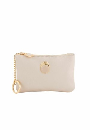 Beige leather pouch with gold hardware. Features a zipper closure, round accent at the front, and a chain attached to a circular ring.